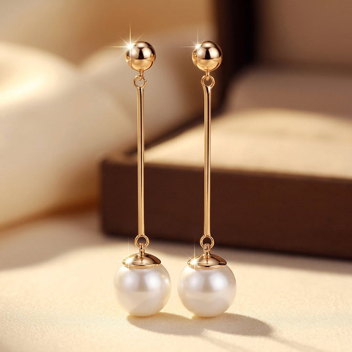 Gold Long Pearl Drop Earrings by Harrison & James - earrings product image 1