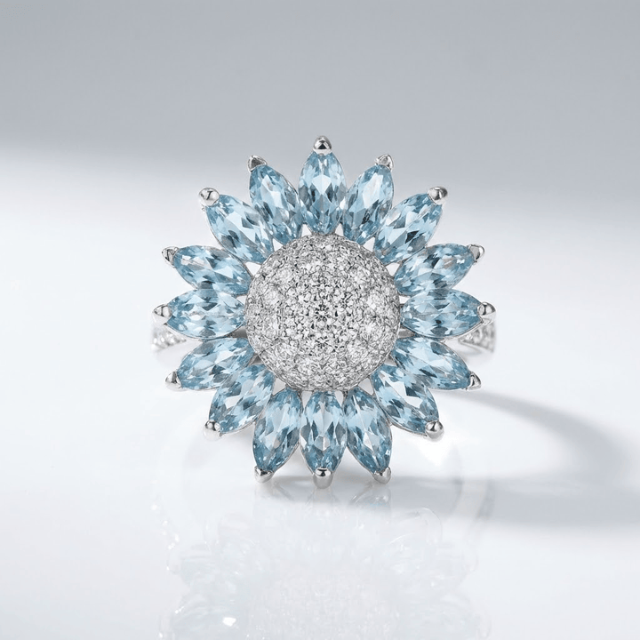 SILVER BLUE TOPAZ FLOWER RING by Harrison & James - ring product image 1