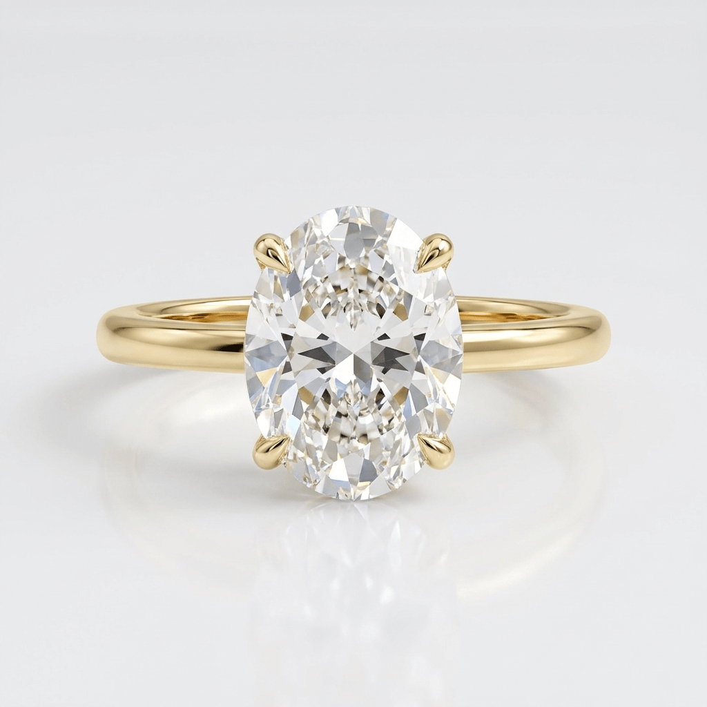 GOLD OVAL DIAMOND SOLITAIRE RING by Harrison & James - ring product image 1