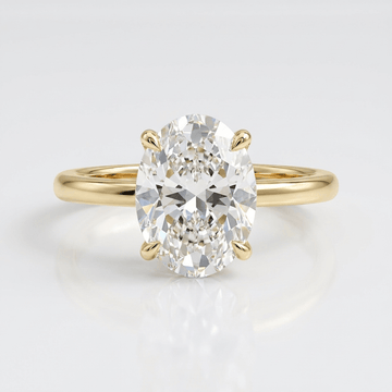 GOLD OVAL DIAMOND SOLITAIRE RING by Harrison & James - ring product image 1