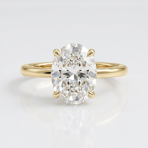 GOLD OVAL DIAMOND SOLITAIRE RING by Harrison & James - ring product image 1