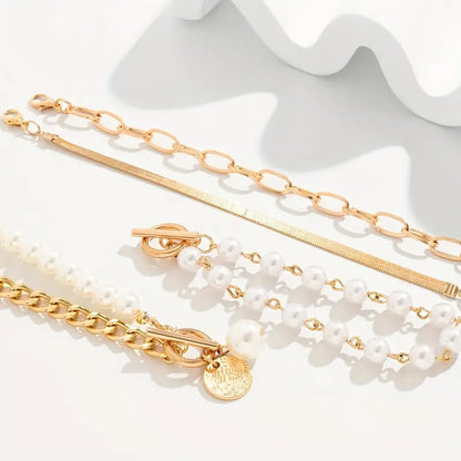 Chic Gold 4-Piece Bracelet Set – Snake, Pearls & Links | Gold by Harrison & James - bracelet product image 2