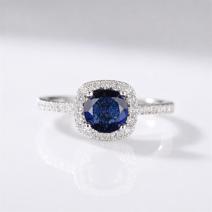 BLUE SAPPHIRE CUSHION HALO RING by Harrison & James - ring product image 1